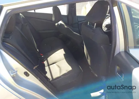 2021 Toyota Prius L Eco z USA, uszkodzony, nr VIN JTDKAMFU9M3143122